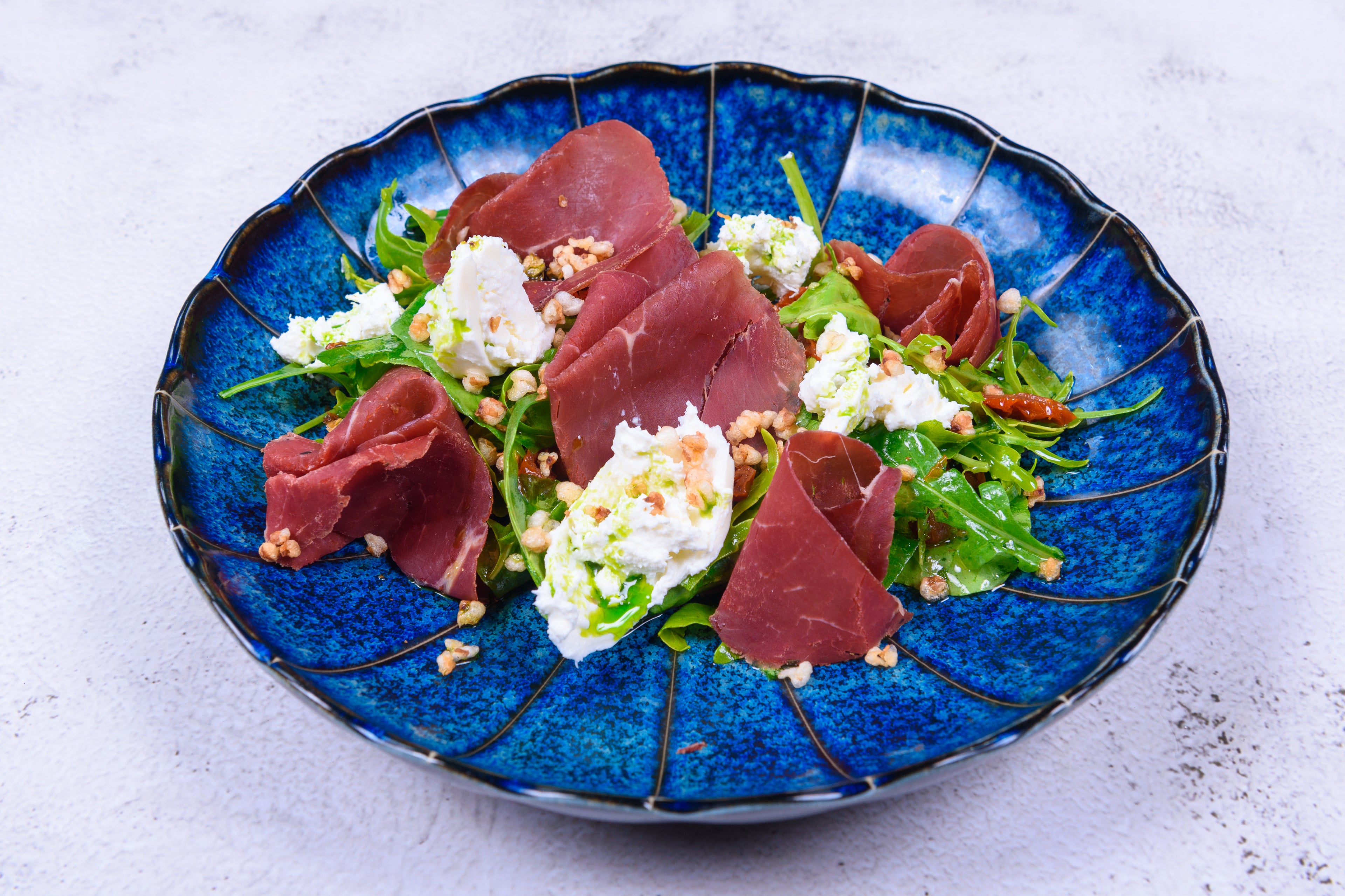 Salad with bresaola and strachetella